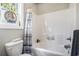 Neat bathroom with a toilet, shower/tub combination, and charming nautical-themed decor at 769 Country Club Dr., Pawleys Island, SC 29585