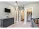 Well-appointed Bedroom with a TV, dresser, closet, and adjoining room, perfect for a growing Gathering at 769 Country Club Dr., Pawleys Island, SC 29585