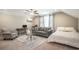Versatile bedroom includes a bed, couch, desk and musical keyboard, offering options for work and relaxation at 769 Country Club Dr., Pawleys Island, SC 29585