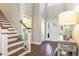 Bright foyer features hardwood floors, staircase, and lots of natural light at 769 Country Club Dr., Pawleys Island, SC 29585
