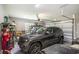 Spacious two car garage with an SUV parked inside at 769 Country Club Dr., Pawleys Island, SC 29585