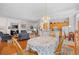 Open-concept living room and kitchen with fireplace and hardwood floors at 86 Wickham Ct., Pawleys Island, SC 29585