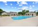 Large community swimming pool with sundeck, chairs and clubhouse for residents enjoyment at 86 Wickham Ct., Pawleys Island, SC 29585