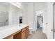 Bathroom with tiled floor, cherry cabinets, shower, toilet, and closet at 101 Culpepper Way # 1006, Myrtle Beach, SC 29579