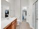 Bathroom with tiled floor, cherry cabinets, shower, toilet, and closet at 101 Culpepper Way # 1006, Myrtle Beach, SC 29579