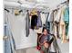 Walk in closet full of clothing and accessories at 101 Culpepper Way # 1006, Myrtle Beach, SC 29579