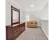 Upstairs hallway area with love seat and cherry dresser at 101 Culpepper Way # 1006, Myrtle Beach, SC 29579