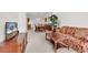 Inviting living room featuring neutral carpet, classic furniture, and ample natural light at 101 Culpepper Way # 1006, Myrtle Beach, SC 29579