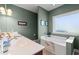 Well-lit bathroom with dual sinks, a soaking tub, and modern fixtures at 1025 Limpkin Dr., Conway, SC 29526
