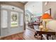 Inviting home foyer featuring hardwood floors and a view into the dining room at 1025 Limpkin Dr., Conway, SC 29526