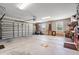 Spacious three car garage with ample storage space, a garage door, and natural light at 1025 Limpkin Dr., Conway, SC 29526
