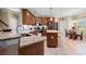 Well-equipped kitchen with granite countertops, island, and stainless steel appliances at 1025 Limpkin Dr., Conway, SC 29526