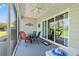 Inviting screened porch featuring a table and chairs, ideal for outdoor dining and relaxation at 1025 Limpkin Dr., Conway, SC 29526