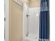 Shower featuring white shower stall and walls with a blue curtain, and a shower head at 1025 Limpkin Dr., Conway, SC 29526