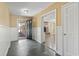 Inviting entryway with tiled floors, leading to an open living space and fireplace at 1043 South Main St., Aynor, SC 29511