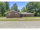 Quaint single story brick home with mature trees in a quiet residential neighborhood at 1043 South Main St., Aynor, SC 29511