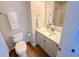 Well-lit bathroom features a white vanity, modern sink, and wood-look flooring at 107 Pawleys Place Dr. # 107, Pawleys Island, SC 29585