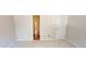 Bedroom view to a half bath and a bedroom door at 107 Pawleys Place Dr. # 107, Pawleys Island, SC 29585