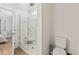 Bathroom with a large glass shower and seat, as well as a modern toilet at 109 Serenity Point Dr., Little River, SC 29566