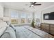 Bright bedroom features natural light from the many windows overlooking the neighborhood at 109 Serenity Point Dr., Little River, SC 29566