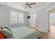 Bedroom with view of bathroom and a large window for plenty of natural light at 109 Serenity Point Dr., Little River, SC 29566