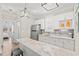 Efficient kitchenette with modern finishes, a marble counter, and ample storage at 109 Serenity Point Dr., Little River, SC 29566
