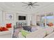 Cozy living room with modern furnishings, stylish decor, and sliding glass doors leading to the outdoors at 109 Serenity Point Dr., Little River, SC 29566
