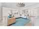 Spacious open concept living area features modern ceiling fan, comfortable seating, and elegant decor at 109 Serenity Point Dr., Little River, SC 29566