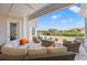 Outdoor patio with comfortable seating and a fire pit with views of the canal at 109 Serenity Point Dr., Little River, SC 29566