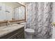 Bathroom with granite vanity, and shower tub combination at 1100 Possum Trot Rd. # C-203, North Myrtle Beach, SC 29582
