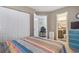 Bright bedroom with closet and ensuite bathroom access at 1100 Possum Trot Rd. # C-203, North Myrtle Beach, SC 29582