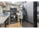 Well-lit kitchen featuring stainless steel appliances, including a Samsung refrigerator and oven at 1100 Possum Trot Rd. # C-203, North Myrtle Beach, SC 29582