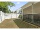 A quaint backyard features a screened in porch at 1102 Stanton Pl. # 1102, Myrtle Beach, SC 29579