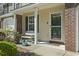 Charming front entrance with a decorative bench and a glass door at 1102 Stanton Pl. # 1102, Myrtle Beach, SC 29579