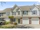 Charming townhome featuring a one car garage and landscaped front yard at 1102 Stanton Pl. # 1102, Myrtle Beach, SC 29579