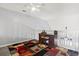 Office loft with colorful rug, desk, chair, and a ceiling fan at 1102 Stanton Pl. # 1102, Myrtle Beach, SC 29579