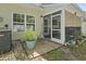 A private patio area features a screened porch and a decorative potted plant at 1102 Stanton Pl. # 1102, Myrtle Beach, SC 29579