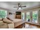 Bedroom with hardwood floors, access to outdoor patio, and neutral decor at 112 Blue Gull Dr., Conway, SC 29526