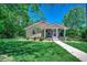 Charming single-story home with a well-manicured lawn and inviting front porch at 112 Blue Gull Dr., Conway, SC 29526