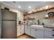 Kitchen featuring white cabinets, stainless steel appliances, butcher block countertops, and rustic open shelving at 112 Blue Gull Dr., Conway, SC 29526