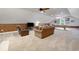 Expansive basement with comfortable seating, tv, and games for entertainment at 113 Trotter Trail, Georgetown, SC 29440