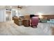 Finished basement features bar seating, a large sectional, tv, and games at 113 Trotter Trail, Georgetown, SC 29440