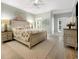 Comfortable bedroom boasts a neutral palette, soft rug, and a lovely dresser for storage at 113 Trotter Trail, Georgetown, SC 29440