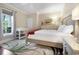 Cozy bedroom featuring a double bed, soft carpet, and a window providing natural light at 113 Trotter Trail, Georgetown, SC 29440