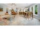 Open-concept living space that connects the living room, dining area, and kitchen for seamless entertaining at 113 Trotter Trail, Georgetown, SC 29440