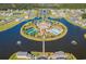 Aerial view of waterfront community featuring a pool, tennis courts, and clubhouse at 1131 East Isle Of Palms, Myrtle Beach, SC 29579
