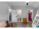 Bedroom featuring doorways leading to closet, bathroom, and stairs at 1131 East Isle Of Palms, Myrtle Beach, SC 29579