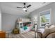 Bedroom features a bunk bed, sitting area, and bright natural light at 1131 East Isle Of Palms, Myrtle Beach, SC 29579