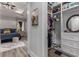 Comfortable bedroom with a walk-in closet and wood-look floors at 1131 East Isle Of Palms, Myrtle Beach, SC 29579
