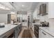Beautiful kitchen with white cabinets, stainless steel appliances, and marble countertops at 1131 East Isle Of Palms, Myrtle Beach, SC 29579